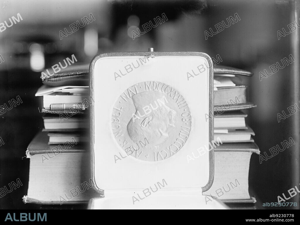 HARRIS & EWING. Nobel Peace Prize - The Medal, 1913. Latin inscription: 'ALFR NOBEL NAT MDCCCXXXIII - OB MDCCCXCVI' - Alfred Nobel - born 1833 - died 1896.