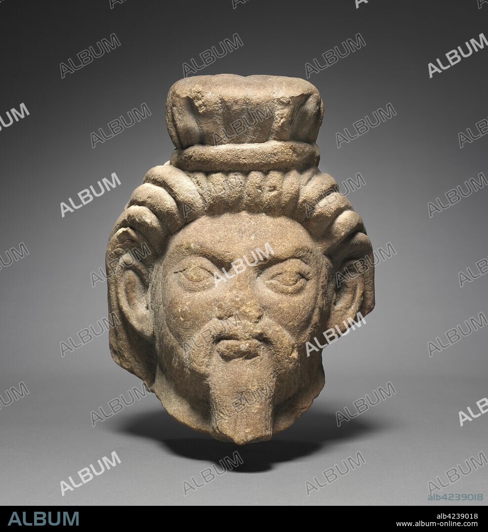 Head of a Rishi, c. 125-150. Northern India, Mathura, Kushan period (c. 80-320). Stone; overall: 27.7 x 24 cm (10 7/8 x 9 7/16 in.).