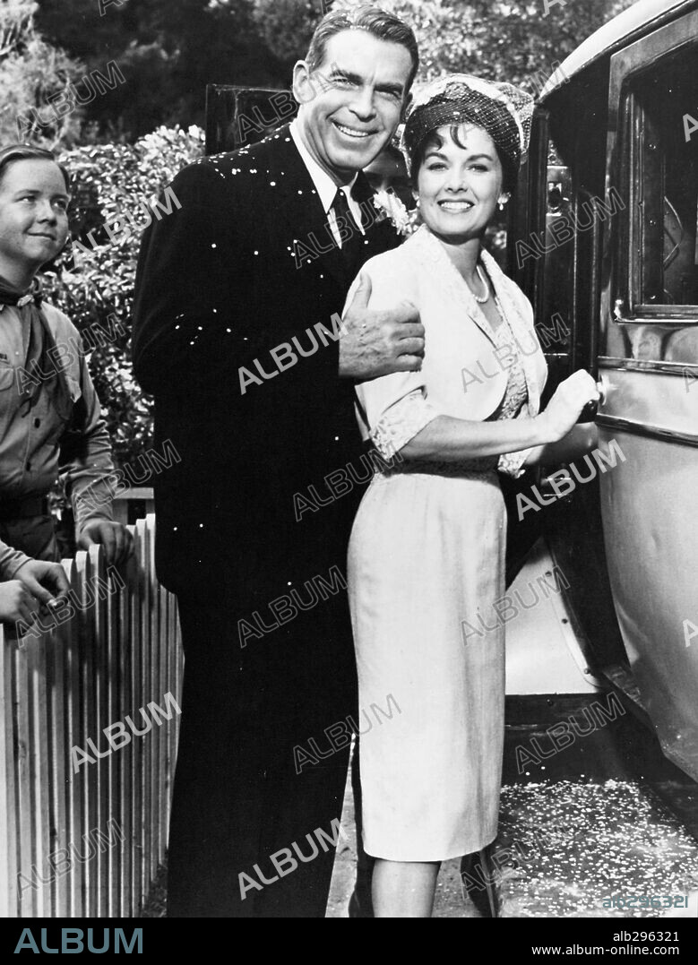 FRED MACMURRAY and VERA MILES in FOLLOW ME, BOYS, 1966, directed by NORMAN TOKAR. Copyright DISNEY.