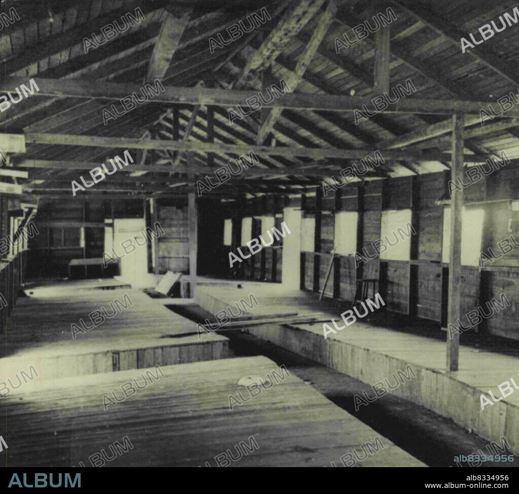 Filipino Prisoners Quarters At Camp O'Donnell -- This is an interior view of the Filipino prisoners quarters at Camp O'Donnell on Luzon, after its capture by American troops. Here Filipino soldiers were imprisoned after the infamous "Death March" of Batman. This, and other pictures in this series, were made by Carl Mydans, life photographer on assignment with the wartime still picture pool. Mydans was among those taken prisoner when the Philippines fell, and was later repatriated. July 02, 1945. (Photo by Carl Mydans, Associated Press Photo).