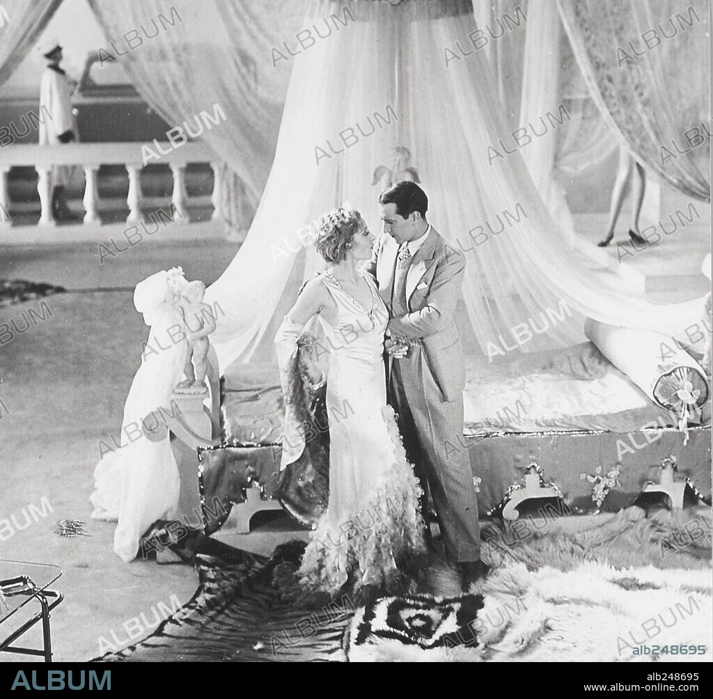 RENE LEFEVRE and WANDA GREVILLE in THE MILLION, 1931 (LE MILLION), directed by RENE CLAIR. Copyright TOBIS FILM.