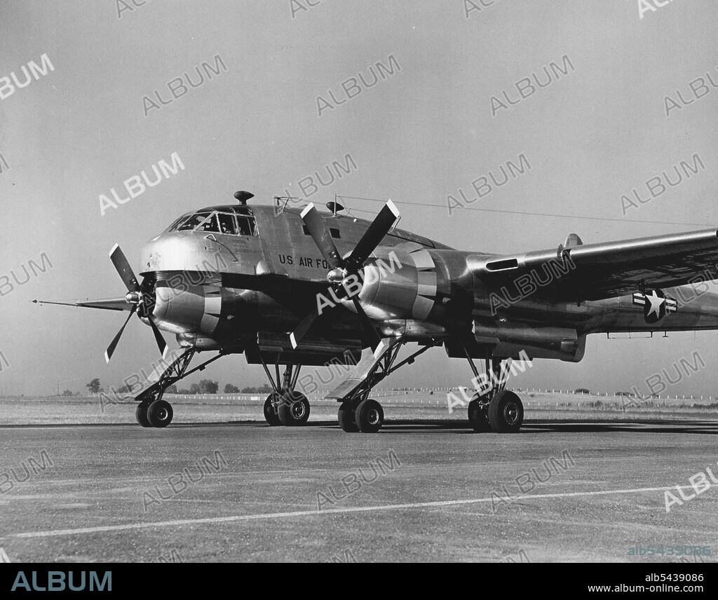This side view of the revolutionary new Fairchild XC-120 Packplane displays the specially-designed quadricycle landing gear developed for the plane. In this picture, the cargo-carrying fuselage has been detached and the plane itself is free to take off for another loaded "pod". October 01, 1950. (Photo by Dan Frankforter, Fairchild Aircraft).;This side view of the revolutionary new Fairchild XC-120 Packplane displays the specially-designed quadricycle landing gear developed for the plane. In thi.