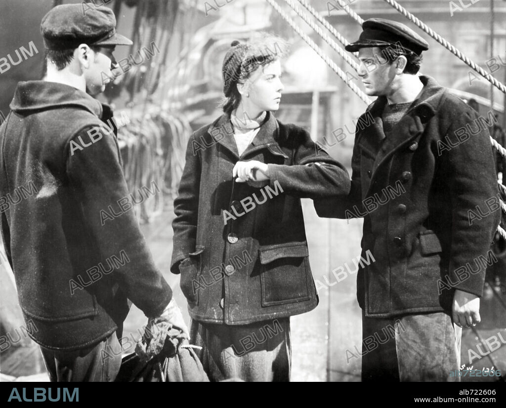 IDA LUPINO y JOHN GARFIELD en EL LOBO DE MAR, 1941 (THE SEA WOLF), dirigida por MICHAEL CURTIZ. Copyright WARNER BROTHERS.