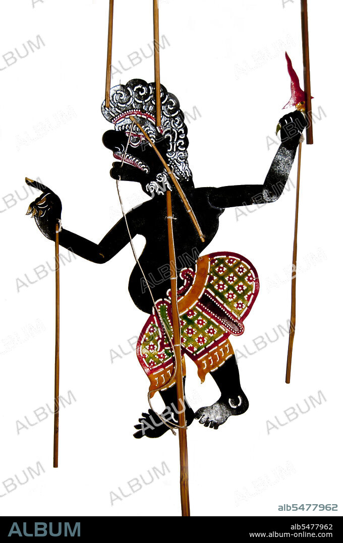 Nang talung' is the shadow puppet theatre popular in southern Thailand. It is an art form said to have originated as early as 400 BC in Southeast Asia. Performances usually last well into the night and remain an essential if diminishing part of village life in Thailand's Deep South. Nang means animal hide, from which the figures are cut. Talung refers to Phatthalung, a town in southern Thailand where the art form is said to have originated.  It is the task of a single skilled person, the 'nai nag' or puppet master, to create the whole show. Sitting behind an illuminated screen, he maneuvers up to six puppets per scene. The changing tone of the puppeteers voice differentiates between the characters, while a band of musicians adds tension to the story. While the more formal 'nang yai' is based on the Hindu epic the Ramayana known as the Ramakien in Thai 'nang talung' takes its inspiration from everyday life.