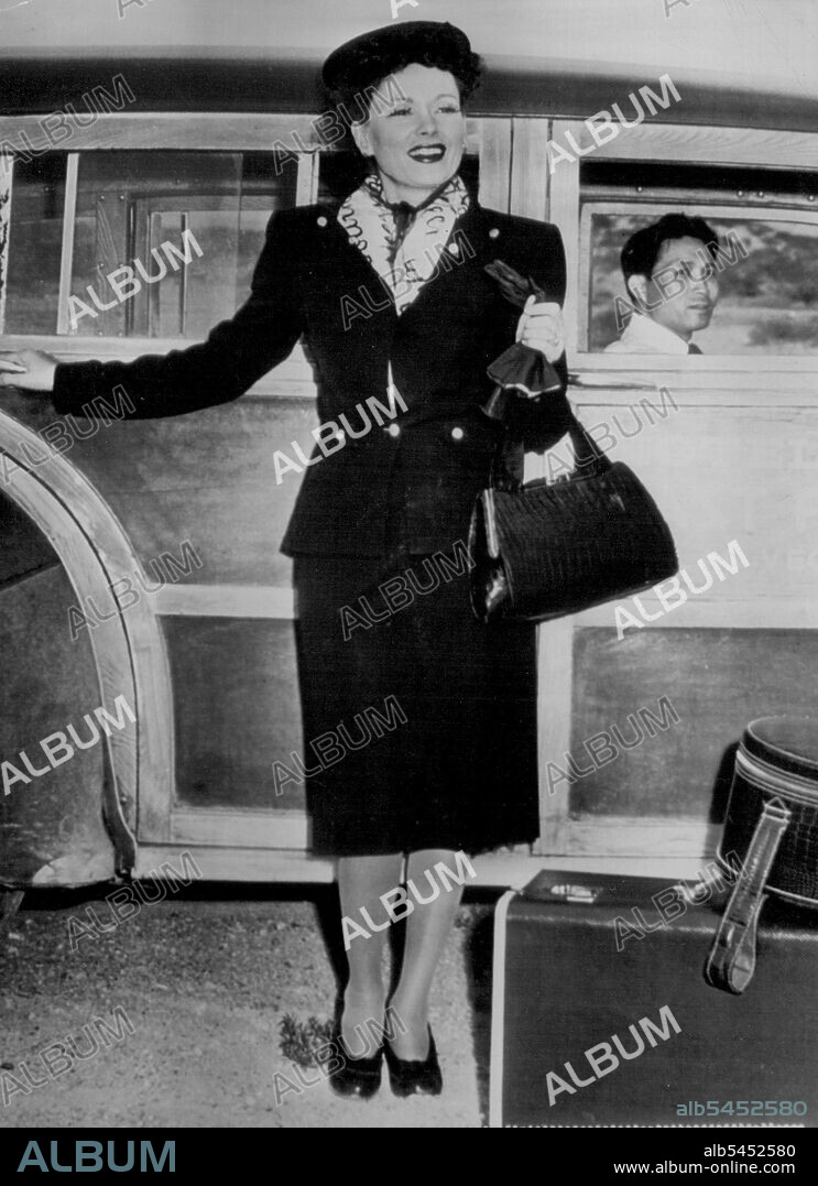 Martha Scott Granted Divorce -- Actress Martha Scott, who yesterday was granted an uncontested divorce degree from Carlton Alsop, stands beside her packed bags ready to fly to New York and London. She's to appear in the top role in a film to be made by Arthur Rank in Britain. July 24, 1946. (Photo by AP Wirephoto).