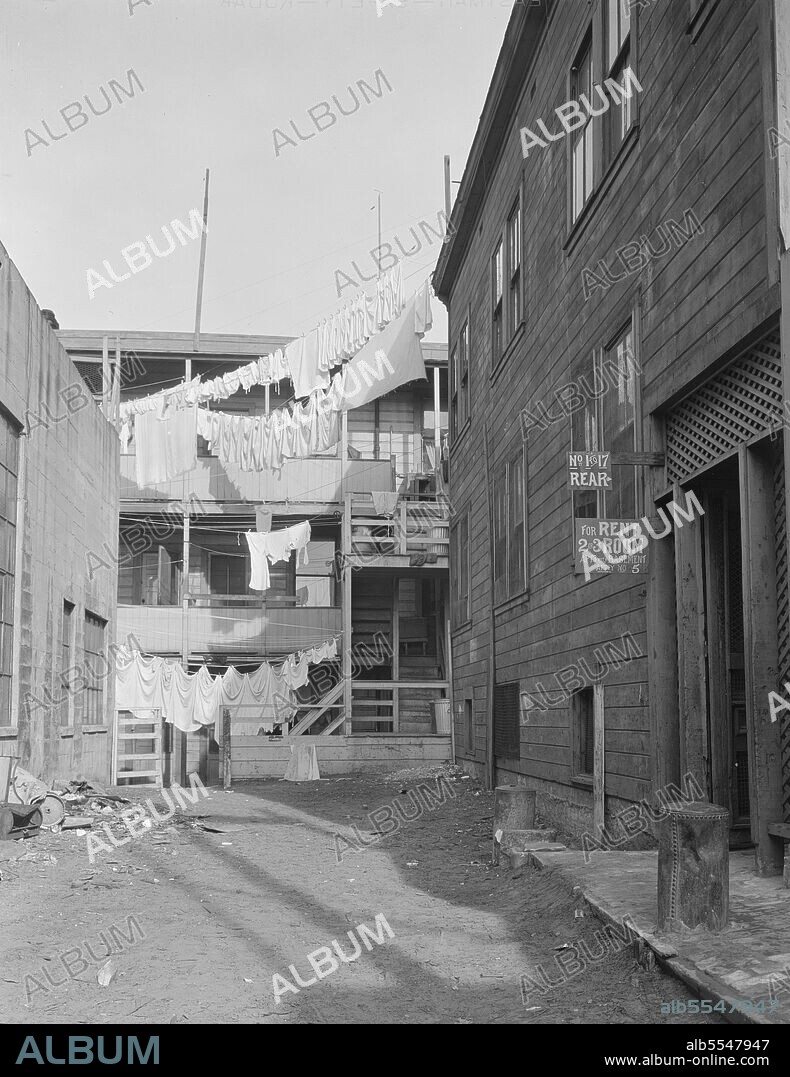 DOROTHEA LANGE. Slums of San Francisco, California.