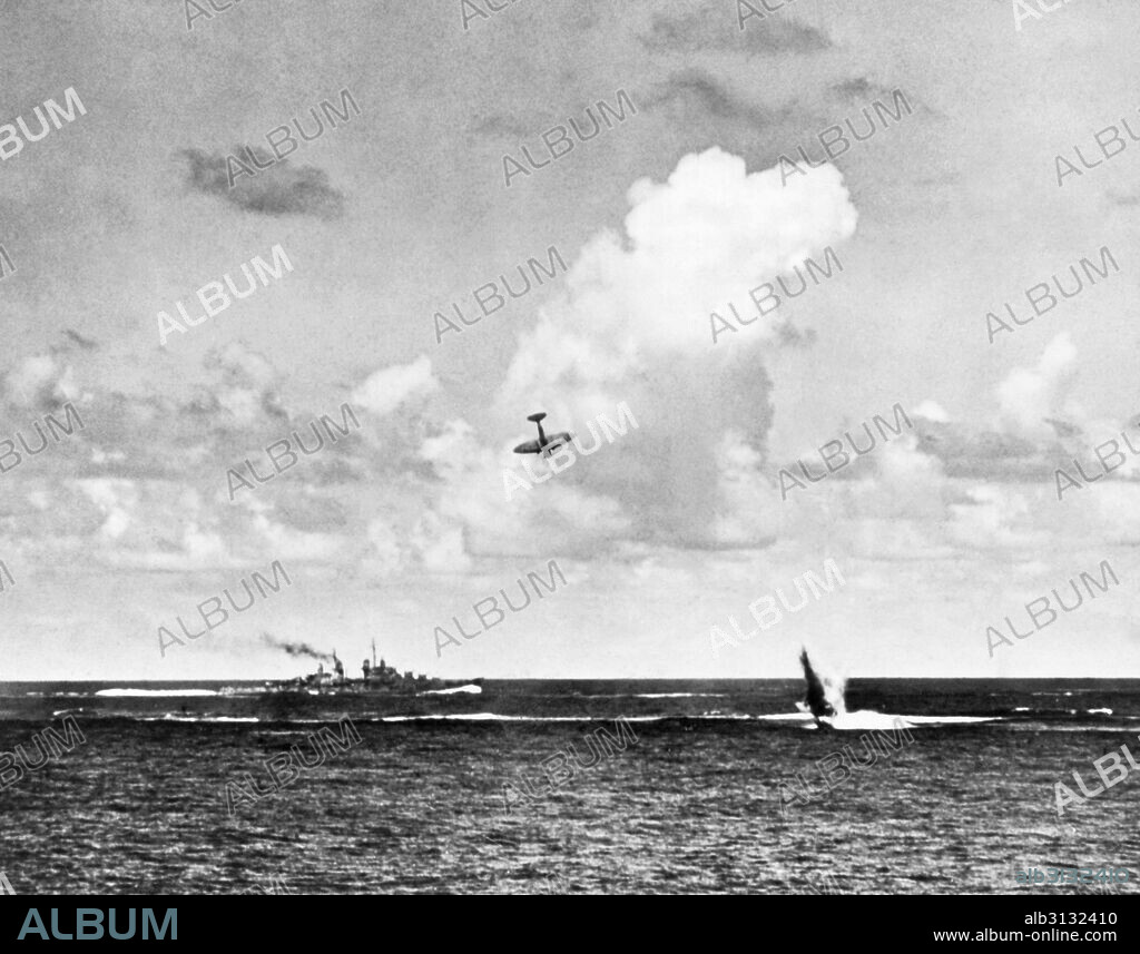 Santa Cruz Islands, Solomon Islands:  October, 1942 Two attacking Japanese airplanes are shot down in the Battle of the Santa Cruz Islands. One has just crashed into the water and the other plummets to a similar fate.