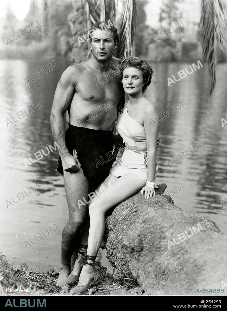 LEX BARKER and VIRGINIA HUSTON in TARZAN'S MATE IN PERIL, 1951 (TARZAN'S PERIL), directed by BYRON HASKIN. Copyright RKO.