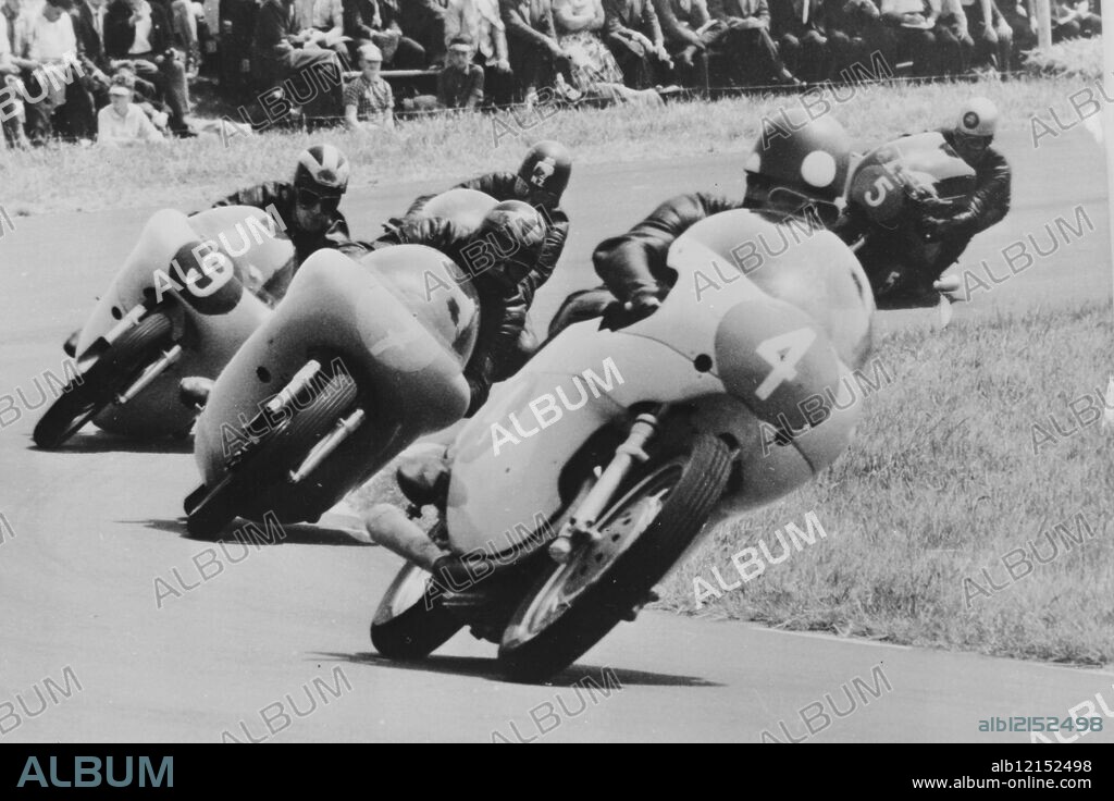 A group of riders led by Italian Vittorio Brambilla on a Bianchi, negotiate a hairpin bend during the 350cc event of the Dutch TT races held in Assen, Holland 24 June 1961. This event was won by Gary Hocking, of Rhodesia, on and Italian MV. Hocking also won the 500cc event, also on an MV. 26 JUNE 1961.