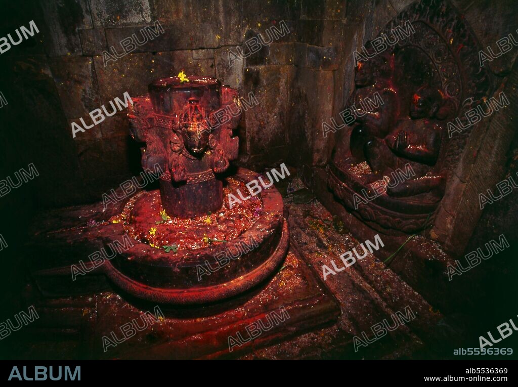 The most revered Hindu site in Nepal is the extensive Pashupatinath Temple complex, five kilometres east of central Kathmandu. The focus of devotion here is a large silver Shivalingam with four faces of Shiva carved on its sides, making it a 'Chaturmukhi-Linga', or four-faced Shivalingam. Pashupati is one of Shiva’s 1,008 names, his manifestation as 'Lord of all Beasts' (pashu means 'beasts', pati means 'lord'); he is considered the guardian deity of Nepal.  The main temple building around the Shivalingam was built under King Birpalendra Malla in 1696, however the temple is said to have already existed before 533 CE. In 733 CE, King Jayadeva II erected in its precincts a stone tablet which chronicled all the kings of Nepal, beginning with the sun god. During the Muslim raids of 1349 the temple was largely destroyed, but in 1381 Jayasinharama Varddhana of Banepa restored it. Further renovations were conducted towards the end of the Malla period, and the latest extensive improvements were made in 1967.  Since the temple's inception, all the rulers of Nepal have taken great pains to pay their respects to it, to make donations, and to finance extensions.