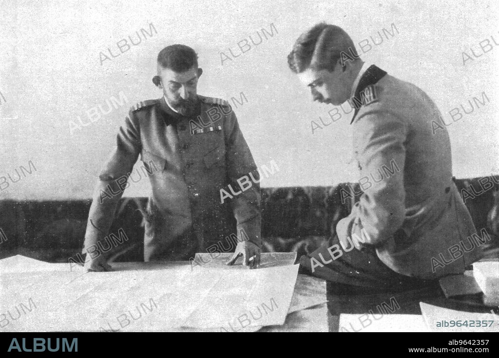 'Au quartier general du roi de Roumanie; le roi Ferdinand et son fils aine, le prince Charles, etudiant la carte', 1916. From "Collection de la Guerre IV. L'Illustration Tome CXLVIII. La Guerre Juillet, Aout, Septembre, Octobre, Novembre, Decembre 1916". ('At the headquarters of the King of Romania; King Ferdinand and his eldest son, Prince Charles, studying a map).