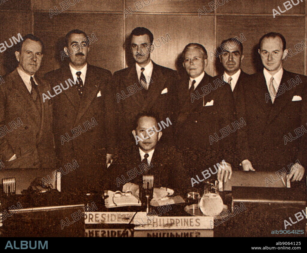 The Fifty Nine Nations assembly at the General Assembly Hall at Flushing Meadow, New York on Saturday, 29 November 1947. President of the UN General Assembly, General Romulo, of the Philipinnes, with the chairmen of the working committee (left to right): Lester Pearson (Canada), Dr Santa Cruz (Chile), Dr Carlos Stolk (Venezuela), Hermod Lannung (Denmark), Alexis Kyrou (Greece), Manfred Lachs (Poland).