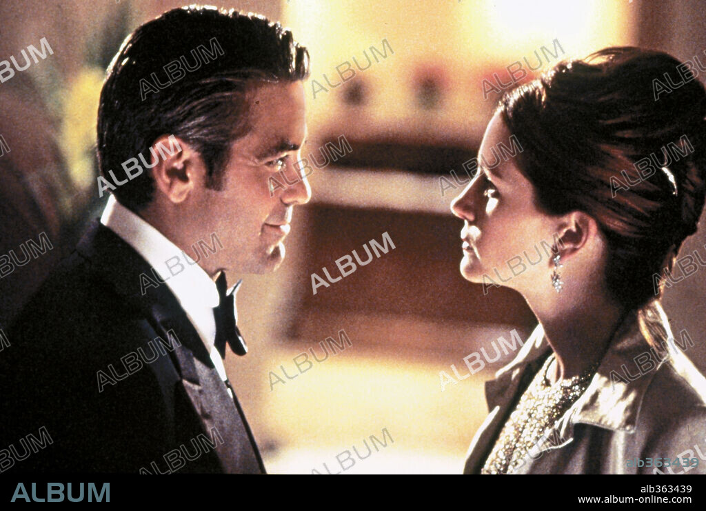 GEORGE CLOONEY y JULIA ROBERTS en OCEAN'S ELEVEN. HAGAN JUEGO, 2001 (OCEAN'S ELEVEN), dirigida por STEVEN SODERBERGH. Copyright JERRY WEINTRAUB PRODUCTIONS/NPV ENTERTAINMENT/SECTION EIGHT / MARSHAK, BOB.