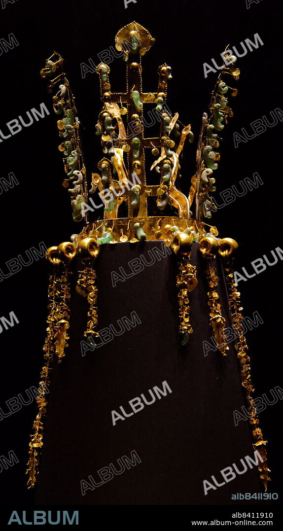 The Gold crown of Silla from Hwangnamdaechong, housed in the National Museum of Korea. It is a National Treasure of Korea. The height of the crown is 27.5 centimetres and the gold chains and pendants that dangle from the crown, known as Suhasik are 13 to 30.3 centimetres in length. The crown is known for its abundant use of jade. The Suhasik are grouped into two groups of three and are arranged with the longest chains on the outer edge to the smallest chains closest to the front of the crown. second half of 5th century. Excavated from the north mound of Hwangnam Daechong Tomb.