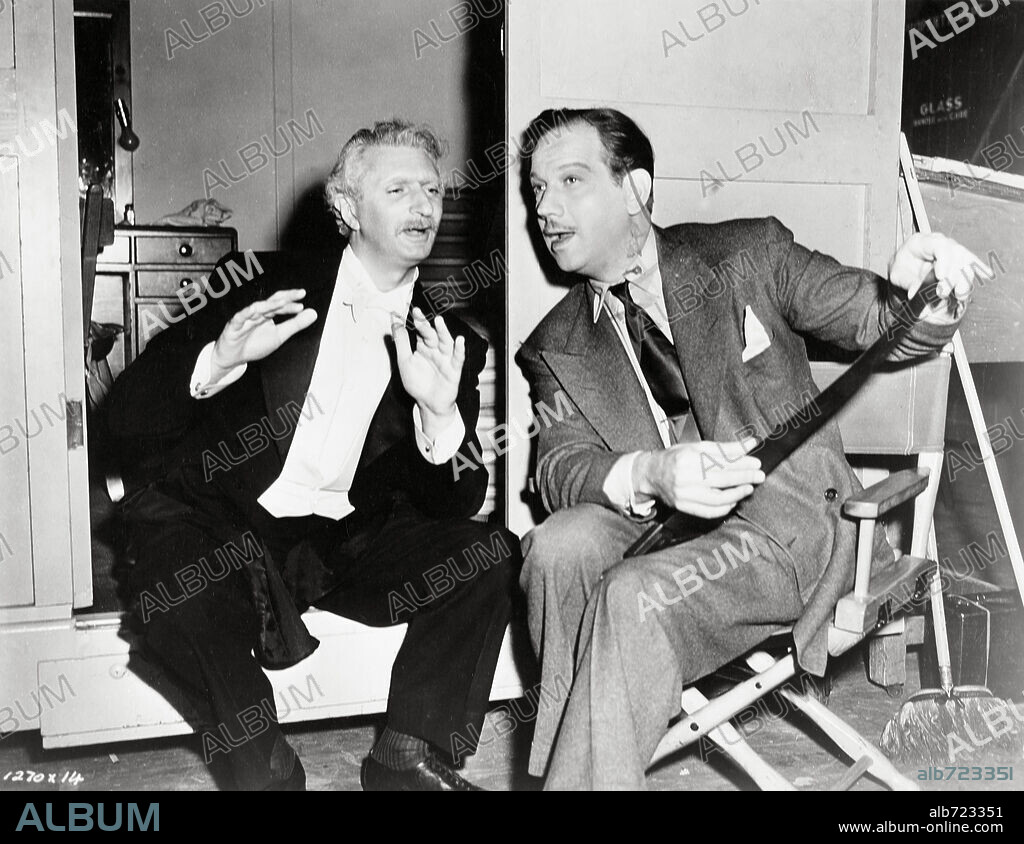 FELIX BRESSART y MELVYN DOUGLAS en NINOTCHKA, 1939, dirigida por ERNST LUBITSCH. Copyright M.G.M.