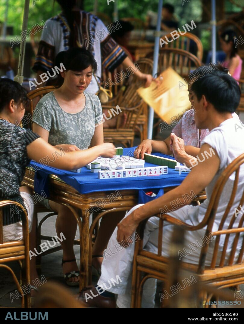Mahjong is a game that originated in China, commonly played by four players (with some three-player variations found in Korea and Japan). Similar to the Western card game rummy, mahjong is a game of skill, strategy and calculation and involves a certain degree of chance. In Asia, mahjong is also popularly played as a gambling game (though it may just as easily be played recreationally). The game is played with a set of 136 tiles based on Chinese characters and symbols, although some regional variations use a different number of tiles. In most variations, each player begins by receiving thirteen tiles. In turn players draw and discard tiles until they complete a legal hand using the fourteenth drawn tile to form four groups (melds) and a pair (head). There are fairly standard rules about how a piece is drawn, stolen from another player (melded), the use of basic (numbered tiles) and honours (winds and dragons), the kinds of melds, and the order of dealing and play. However there are many regional variations in the rules; in addition, the scoring system, the minimum hand necessary to win varies significantly based on the local rules being used.