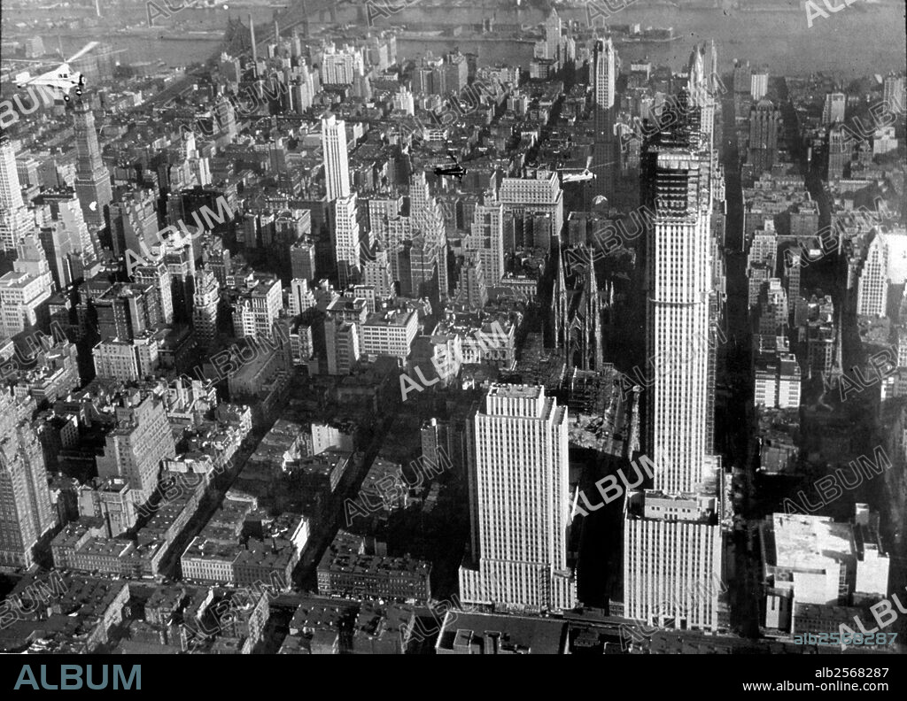 An aerial view of New York showing the Rockefeller Center Building and the RKO building 1932.