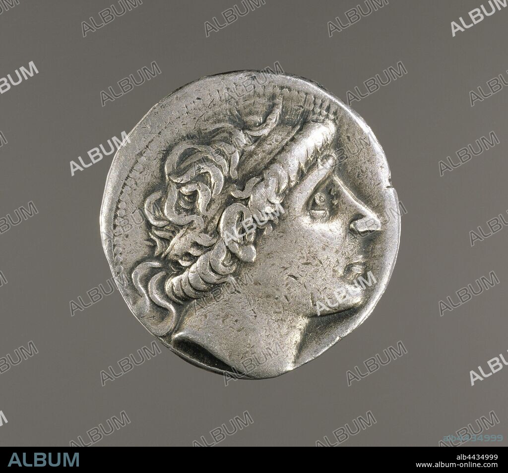 Apollo Sitting on an Omphalos, Unknown, Seleucia on Tigris, Iraq, about 281 - 261 B.C., Silver, 2.5 cm (1 in.).