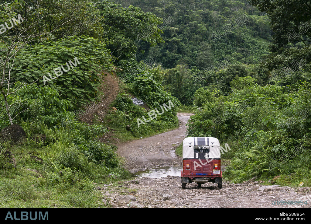 Tuc-tuc en el camino de La Taña a Union 31 Mayo, , zona Reyna, departamento de Uspantan,Guatemala, Central America.