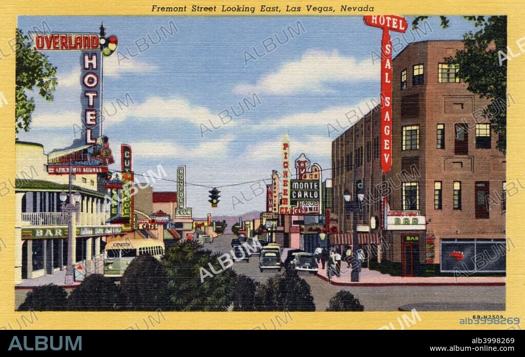 'Fremont Street looking East, Las Vegas, Nevada', postcard, 1946. Vintage linen postcard image showing the view east on Fremont Street. The Sal Sagev and Overland Hotels are in the forefront. Cars and a bus are in the view which also shows mountains in the distance. Neon signs from the hotels and clubs are visible.