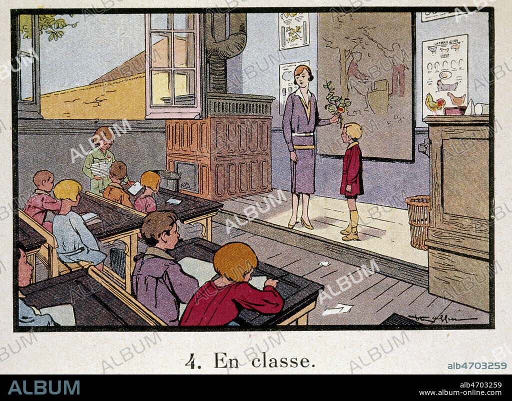 'En classe' : institutrice avec un enfant sur l'estrade qui est interroge sur la lecon de choses. Enorme poele a bois dans la classe. Classe mixte ecole elementaire.. l'Imagier de l'Enfance , publie vers 1930, a l'usage des ecoles maternelles, des cours preparatoires et elementaires. Illustrations par RAFFIN. Credit : Collection KHARBINE-TAPABOR.