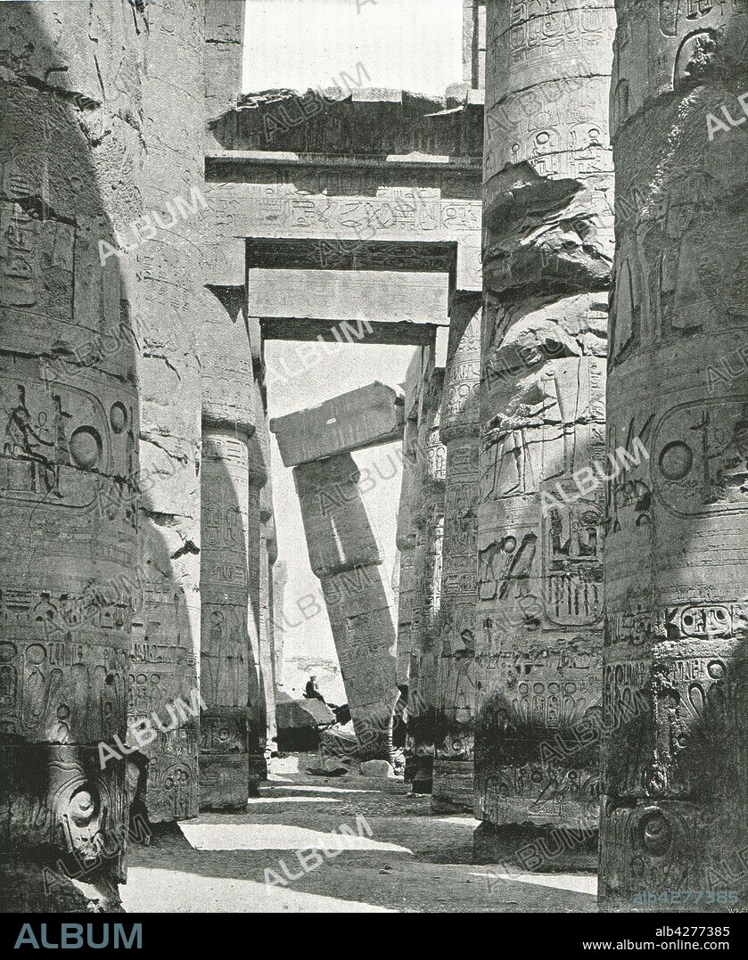 Columns of the Hypostyle Hall, Karnak, Egypt, 1895. Carved and decorated pillars at the temple of Amun-Re at Karnak (Thebes), built in the 14th-13th century BC in the reigns of Rameses I and Rameses II. From "Round the World in Pictures and Photographs: From London Bridge to Charing Cross via Yokohama and Chicago". [George Newnes Ltd, London, 1895].