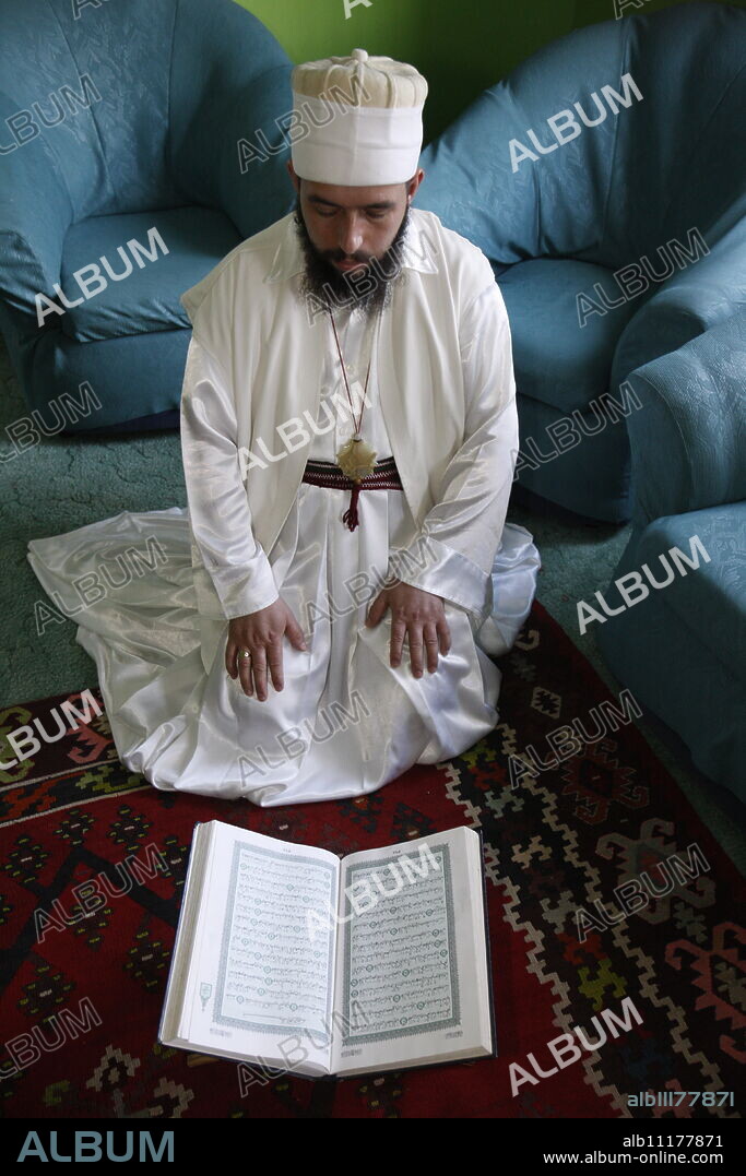 Bektachi dervish reading Koran, Tirana, Albania, Europe.
