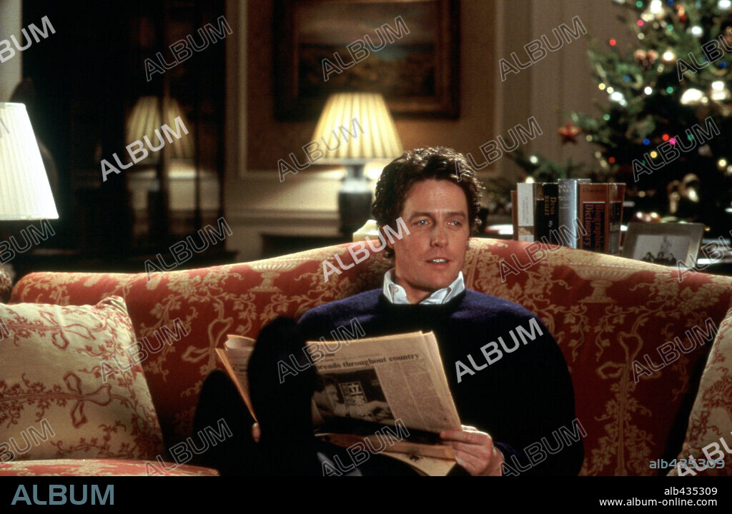 HUGH GRANT in LOVE ACTUALLY, 2003, directed by RICHARD CURTIS. Copyright UNIVERSAL STUDIOS / MOUNTAIN, PETER.