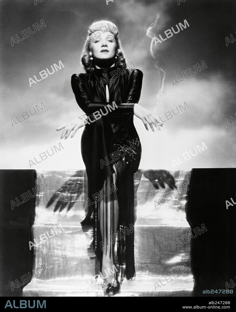 MARLENE DIETRICH in MANPOWER, 1941, directed by RAOUL WALSH. Copyright WARNER BROTHERS. Costume designer: Orry Kelly.