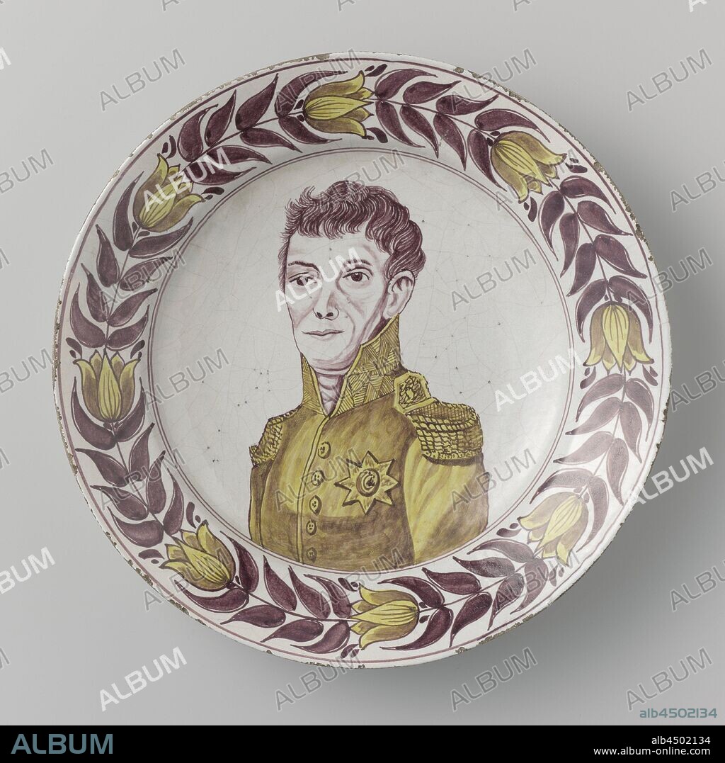 Portrait of Willem I, Dish of (Delft?) Earthenware painted in manganese and yellow on the white tin glaze. On the shelf the portrait of King Willem I. On the edge a wreath of tulips. Marked. The object is VALS, historical persons, king, Willem I Frederik (King of the Netherlands), anonymous, Netherlands, c. 1800 - c. 1825, earthenware, glaze, d 34.8 cm × h 6 cm.