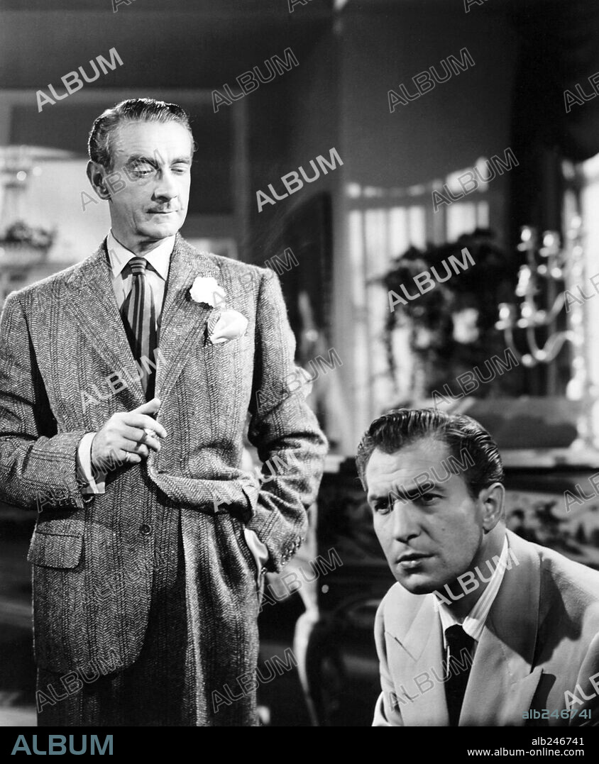 CLIFTON WEBB und VINCENT PRICE in LAURA, 1944, unter der Regie von OTTO PREMINGER. Copyright Twentieth Century-Fox.