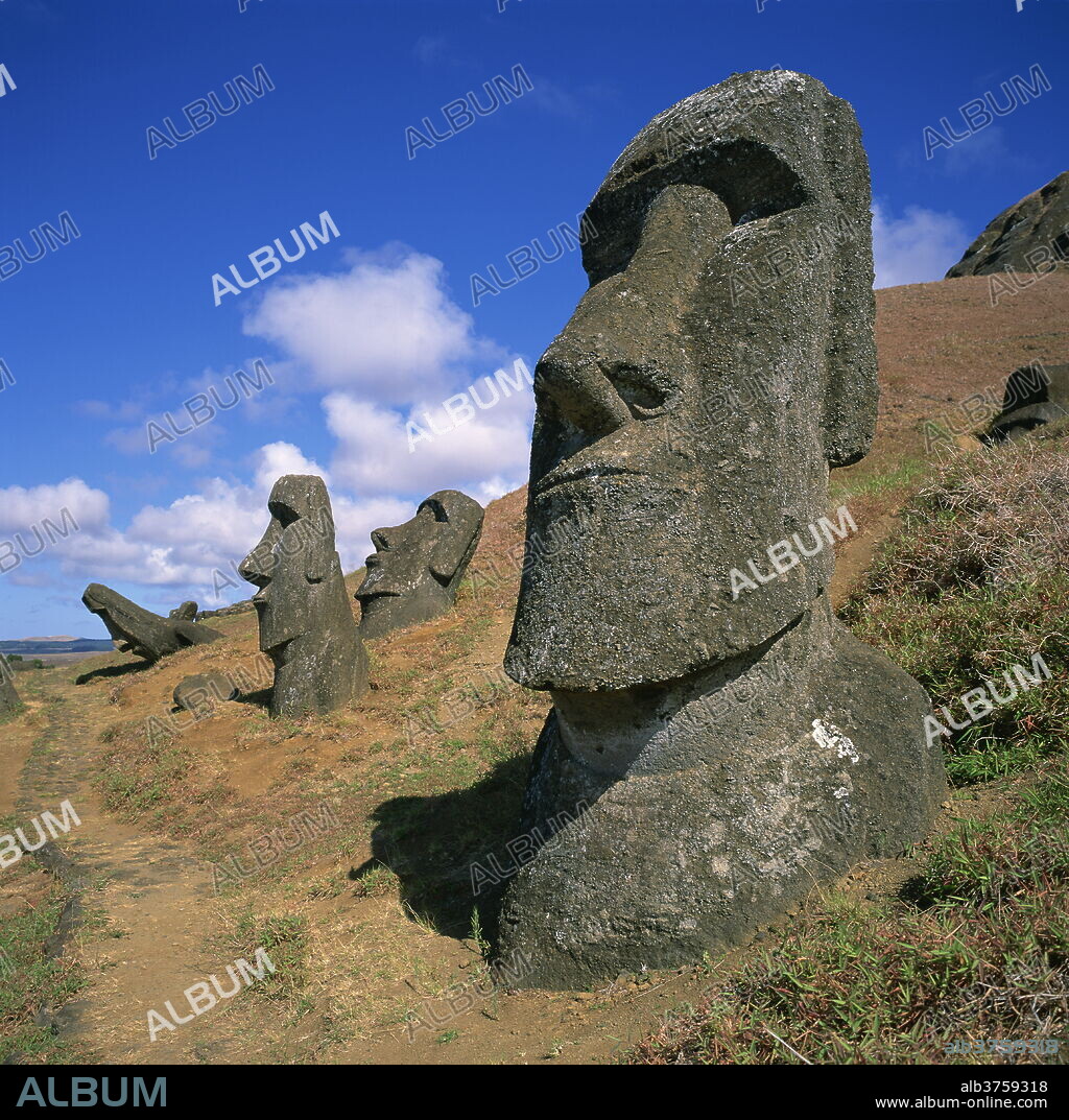 Moai statues carved from crater walls, on the southern slopes of Volcan Rano Raraku, the birthplace of the moai, Easter Island (Rapa Nui), UNESCO World Heritage Site, Chile, South America.