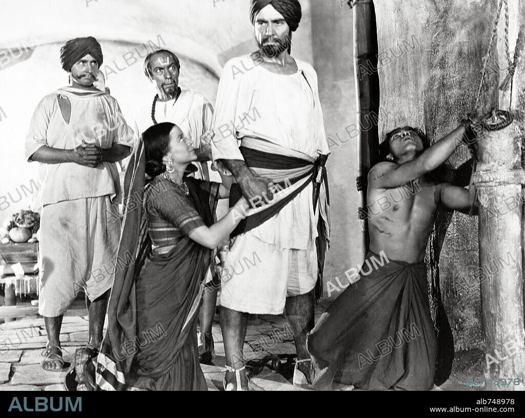 JOSEPH CALLEIA and SABU in THE JUNGLE BOOK, 1942, directed by ZOLTAN KORDA. Copyright UNITED ARTISTS.