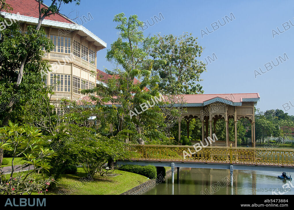 The Vimanmek Mansion is a former royal palace and is also known as the Vimanmek Teak Mansion or Vimanmek Palace. Vimanmek Mansion was built in 1900 by King Rama V (King Chulalongkorn) by having the Munthatu Rattanaroj Residence in Chuthathuj Rachathan at Ko Sichang, Chonburi, dismantled and reassembled in Dusit Garden. It was completed on March 27, 1901 and used as a royal palace by King Rama V for five years. In 1982 Queen Sirikit asked permission of King Rama IX (Bhumibol Adulyadej) to renovate Vimanmek Palace for use as a museum to commemorate King Rama V by displaying his photographs, personal art and handicrafts. The palace is the world's largest golden teakwood mansion.