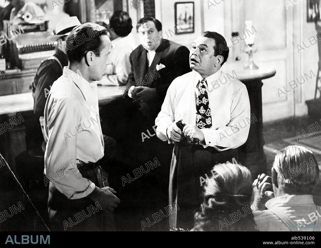 EDWARD G. ROBINSON and HUMPHREY BOGART in KEY LARGO, 1948, directed by JOHN HUSTON. Copyright WARNER BROTHERS.