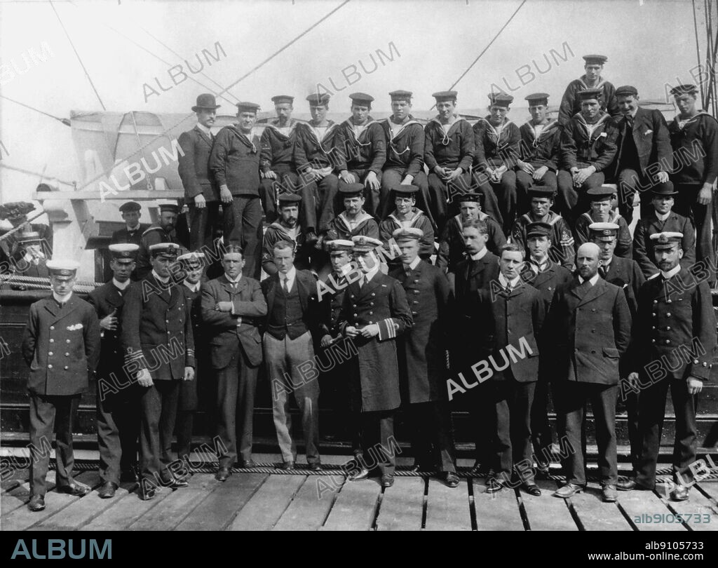 Captain Scott and his Ships Company.. Top Row Blissett, Allan, Wild, Croucher, Kennar, Handsley, Lashly, Crean, Dell, Evans, Plumley, Clarke, Weller.. Middle Row: Pilbeam, Joyce, WIlliamson, Heald, Cross, Smythe, Scott. Front Row: Feather Lt Mulock, Lt Shackleton, Dr Wilson, Lt Eng Skelton, Capt Scott, Lt ROyds, Dr Koettlitz, Mr Ferrar, Dellbridge, Lt Armitage, Mr Bernacchi, Mr Hodgson, Dailey.