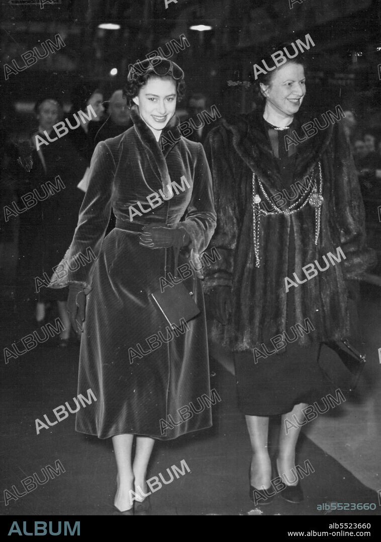 Princess Margaret wearing a dark grey velvet coat with fur collar and a matching hat with scalloped edge, arrives at Newcastle-on-Tyne to name the passenger ship Maori (7,000 tons) yesterday.Fifteen thousand people were in the Vickers Armstrong naval shipyard to see the ship launched - a quarter of an hour earlier than was expected, because the Princess's visit ran ahead of schedule.Princess Margaret in dark grey velvet coat with fur collar and matching hat with scalloped edge, arrives at Newcastle-on-Tyne to name the 7000-ton passenger ship Maori, intended for the NZ inter-island trade. November 28, 1952. (Photo by Daily Mirror).