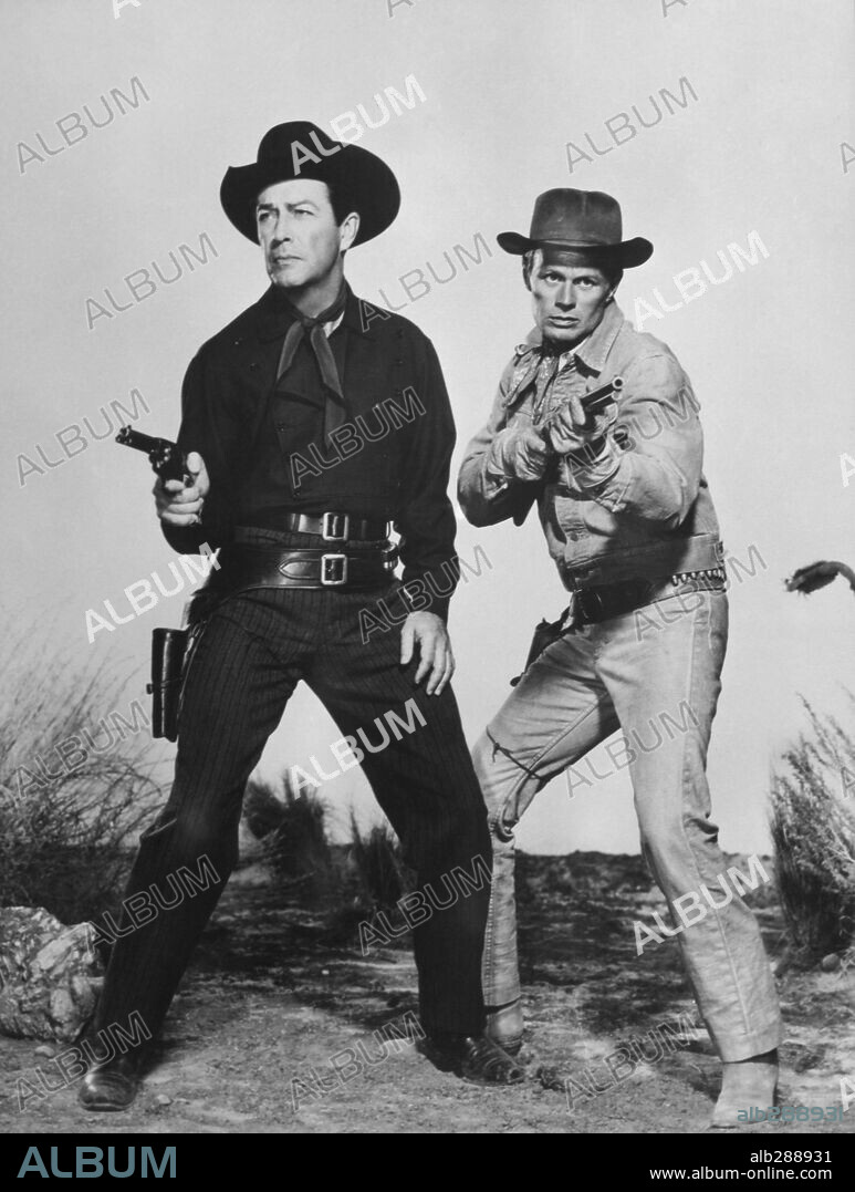 RICHARD WIDMARK and ROBERT TAYLOR in THE LAW AND JAKE WADE, 1958, directed by JOHN STURGES. Copyright M.G.M.