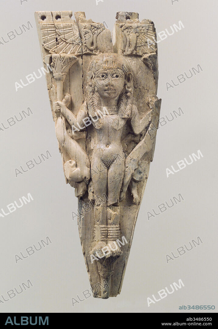 Horse frontlet carved in relief with a female figure flanked by lions, Neo-Assyrian, ca. 9th–8th century B.C., Mesopotamia, Nimrud (ancient Kalhu), Assyrian, Ivory, 6.38 x 2.6 in. (16.21 x 6.6 cm), Ivory/Bone-Equestrian, Over two hundred ivory and gypsum alabaster equestrian bridle-harness ornaments have been found at Nimrud. The majority, including this fragmentary triangular frontlet which adorned a horse’s forehead, were found in a large storeroom (Room SW 37) at Fort Shalmaneser, a royal building at Nimrud that was probably used to store tribute and booty collected by the Assyrians while on military campaign.