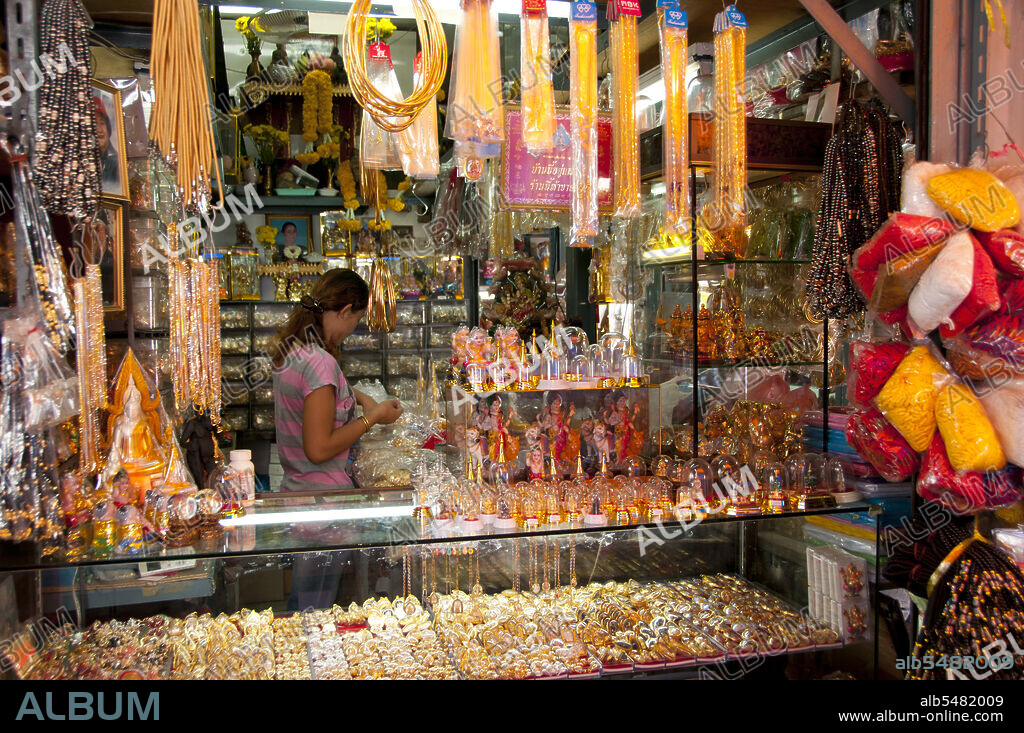 The religious paraphernalia market within the grounds of Wat Ratchanatda sells Buddha images and Buddhist charms in all shapes and sizes as well as a variety of Indian Hindu deities and Chinese religious items. Wat Ratchanaddaram was built on the orders of King Nangklao (Rama III) for Mom Chao Ying Sommanus Wattanavadi in 1846. The temple is best known for the Loha Prasada (Loha Prasat), a multi-tiered structure 36 m high and having 37 metal spires. It is only the third Loha Prasada (Brazen Palace or Iron Monastery) to be built and is modelled after the earlier ones in India and Anuradhapura, Sri Lanka.