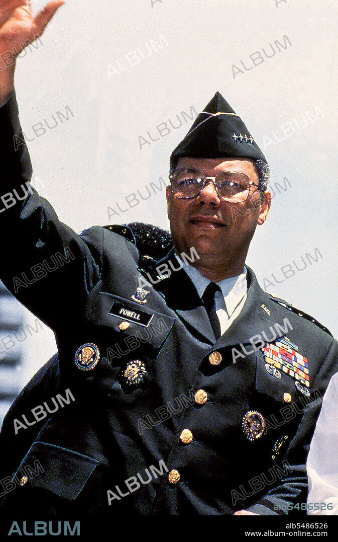 US Army (USA) General Colin Powell, Chairman, Joint Chiefs of Staff, waves from his motorcade during the Persian Gulf War, Welcome Home Parade, held in New York City, New York (NY).