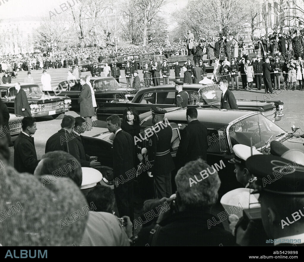 The Kennedy family gathers at Arlington Cemetery for the graveside services for President John F. Kennedy. November 25, 1963. Abbie Rowe photographer.
