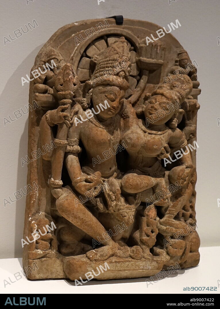 Statue depicting Shiva and Parvati. Shiva is known as the God of Creation, Destruction, Regeneration, Meditation, Arts, Yoga and Moksha. Parvati is known as the goddess of fertility, love and devotion; as well as of divine strength and power. Dated 12th Century.