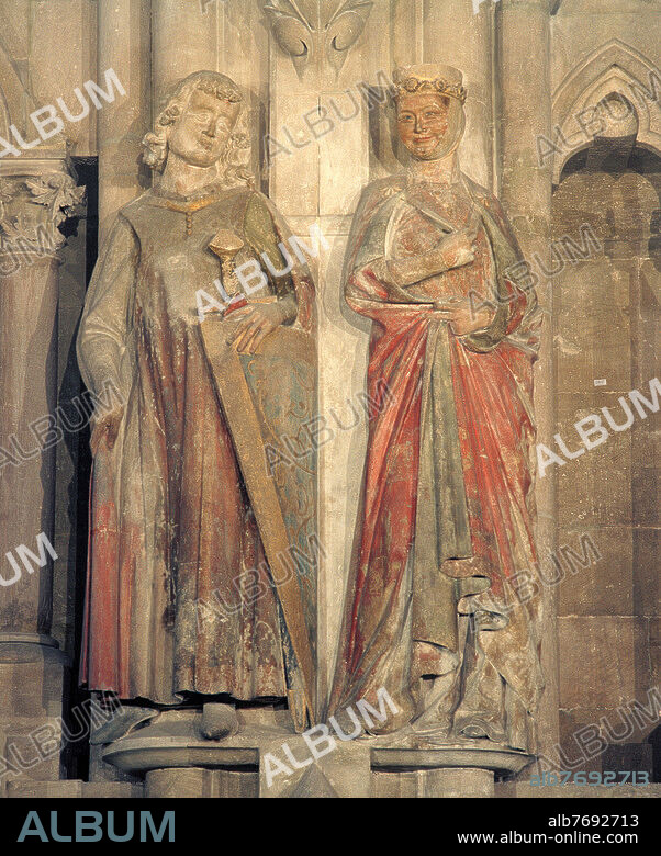 NAUMBURGER MEISTER. Naumburg (Saxony-Anhalt), Cathedral of St. Peter and Paul, West choir. - Donor figures of Hermann and Reglindis. - Sculpture, Naumburg, Naumburg Master, between 1243 and 1249. (Hermann I, Markgrave of Meißen; c. 980 - 1. 11. 1038, and his consort Reglindis, daughter of king Boleslav I of Poland, c. 988/989-1014). Limestone, colour, Hermann height 180 cm, width 65 cm, depth 40 cm, Reglindis hight 178 cm, width 58 cm, depth 38 cm. From the series of twelve donor figures in the west choir of the Naumburg Cathedral, transition of the choir bay to the polygon, southern interior wall.