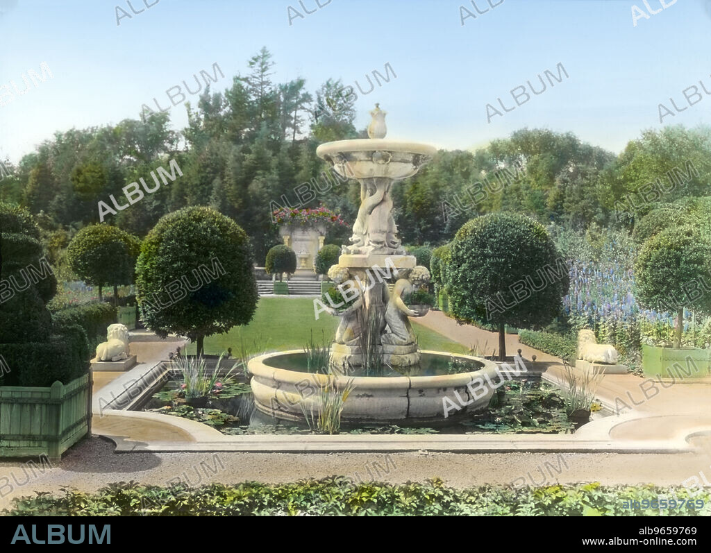 Italian Garden with Cupid Fountain, "Weld" Estate, home of Larz and Isabel Anderson, 151 Newton Street, Brookline, Massachusetts, USA, Hand-Colored Lantern Slide, photo by Frances Benjamin Johnston, Mattie Edwards Hewitt, 1914.