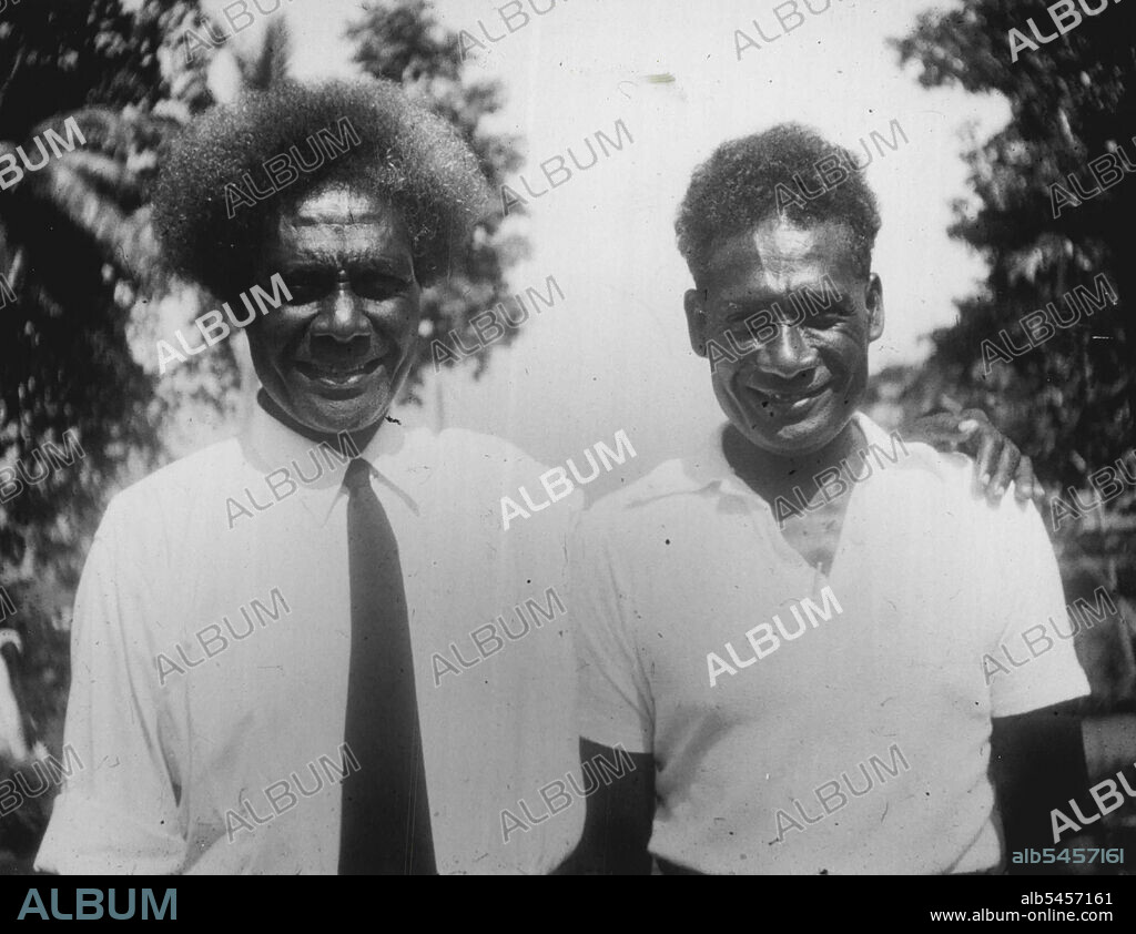Kata Ragoso and one of his younger brothers, Jimaru also and Adventist pastor. August 20, 1954.