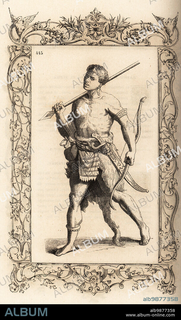 Warrior of the Swahili Coast, 16th century (Kenya, Tanzania, Mozambique, Somalia, Comoros). He wears a loincloth, animal skin with tail, and carries assegai lance, bow and arrows, cutlass. Costume de quelques Maures noirs de Zanguebar en Afrique. Within a decorative frame engraved by H. Catenacci and Fellmann. Woodblock engraving by Gerard Seguin and E.F. Huyot after a woodcut by Christoph Krieger from Cesare Vecellios 16th century Costumes anciens et modernes, Habiti antichi et moderni di tutto il mondo, Firman Didot Ferris Fils, Paris, 1859-1860.