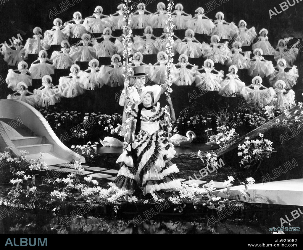 DONALD WOODS and IRENE DUNNE in SWEET ADELINE, 1934, directed by MERVYN LEROY. Copyright WARNER BROTHERS.