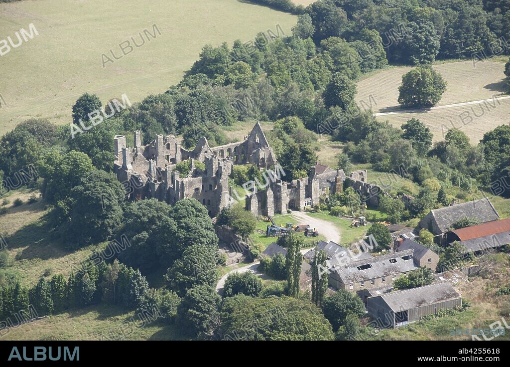Ruins of Wingfield Manor House and Manor Farm, South Wingfield, Derbyshire, 2014. Wingfield Manor was built in c1450 for Ralph de Cromwell, 3rd Baron Cromwell. Mary, Queen of Scots was imprisoned at Wingfield in 1569. The house was abandoned in the 18th century but a working farm forms part of the old manor.