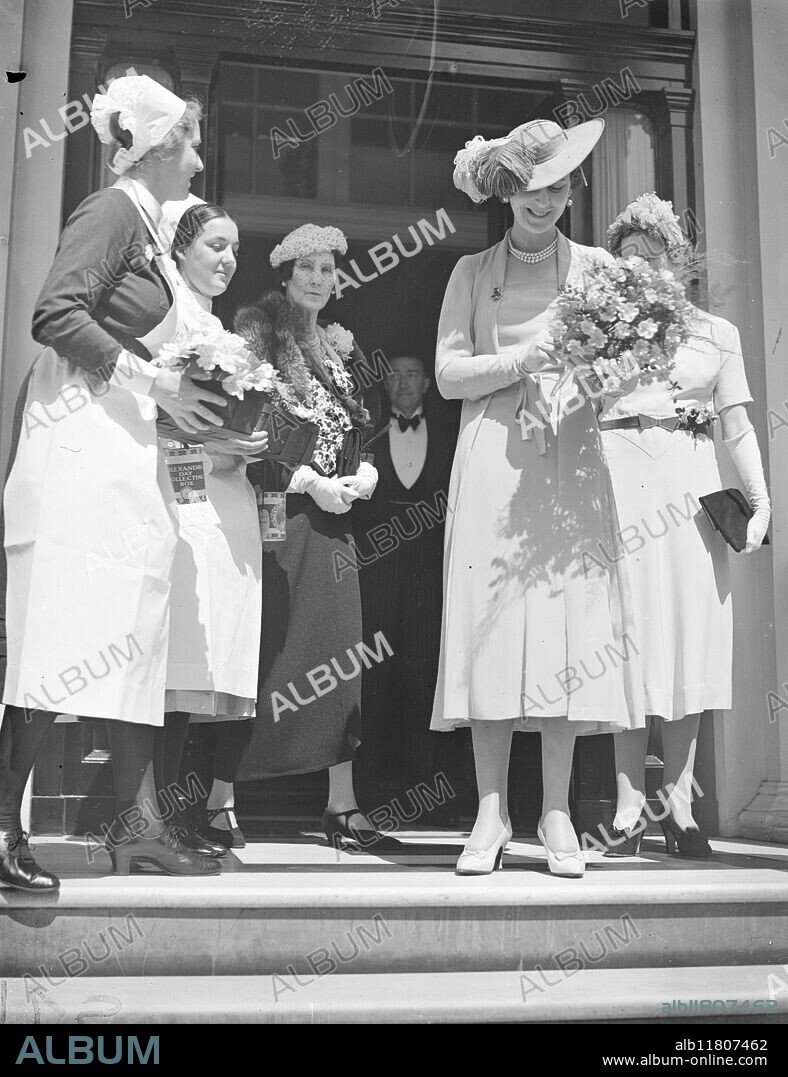 The Duchess of Kent , President of the Queen Alexandra Rose Day Fund , starts on her tour of the sellers depots. 21 June 1938.